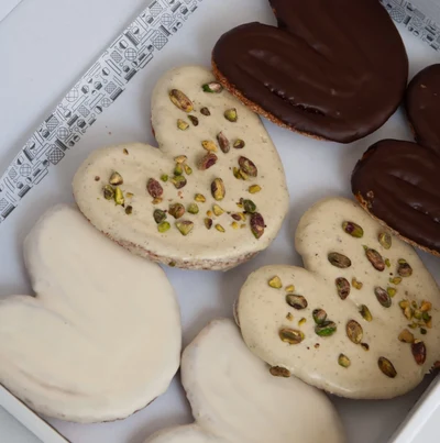 Caja de 6 unidades de palmeras bañadas variadas