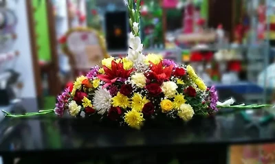 Centro Funerario Cojín Colorido