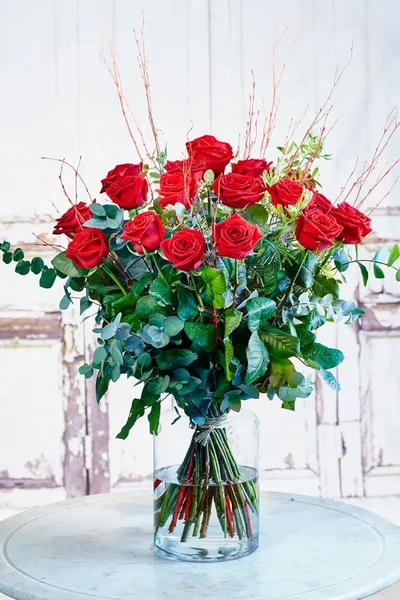 18 Rosas en jarrón