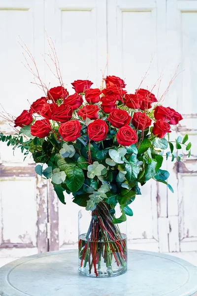 24 Rosas en jarrón