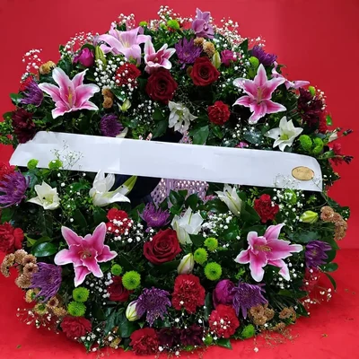 Corona funeraria roja