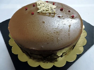 Trufa Blanca banyada en xocolata amb llet.