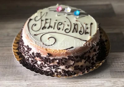 Chocolate, vanilla and white chocolate cake with PHOTO