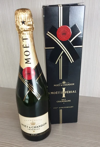Möet Chandon champagne with box and bow